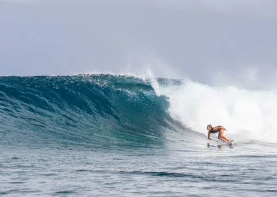 Olympian Brisa Hennessy surfing a wave at Matapalo, Costa Rica.