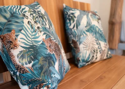 Decorative jungle tiger cushion detail in Casita del Tigre.