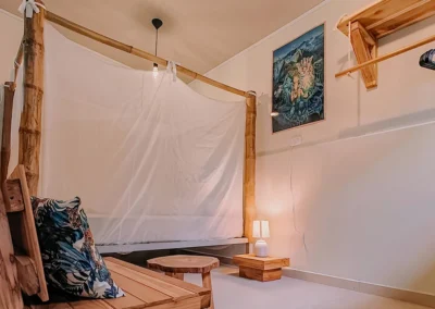 Interior of private cabin room in Casita del Tigre with natural decor.