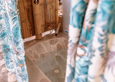 Tiger print shower curtain in a bath at Templo del Tigre.