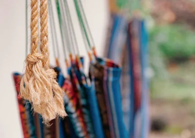 Close-up detail of a colorful hammock at Templo del Tigre retreat.