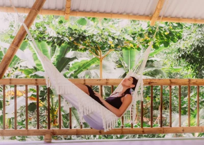 Open-air yoga shala at a retreat center in Costa Rica surrounded by nature.