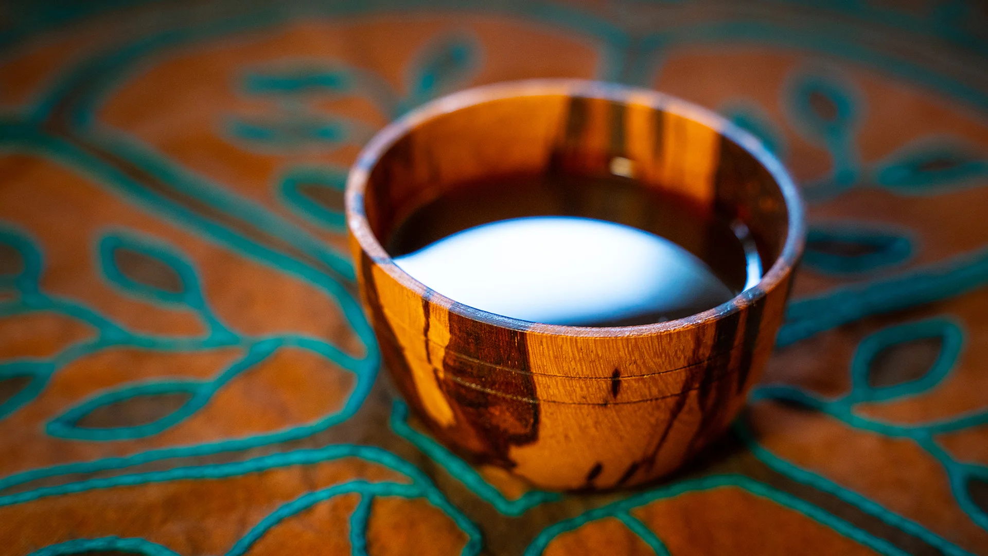 Nicotiana rustica plant medicine in ceremonial cup.