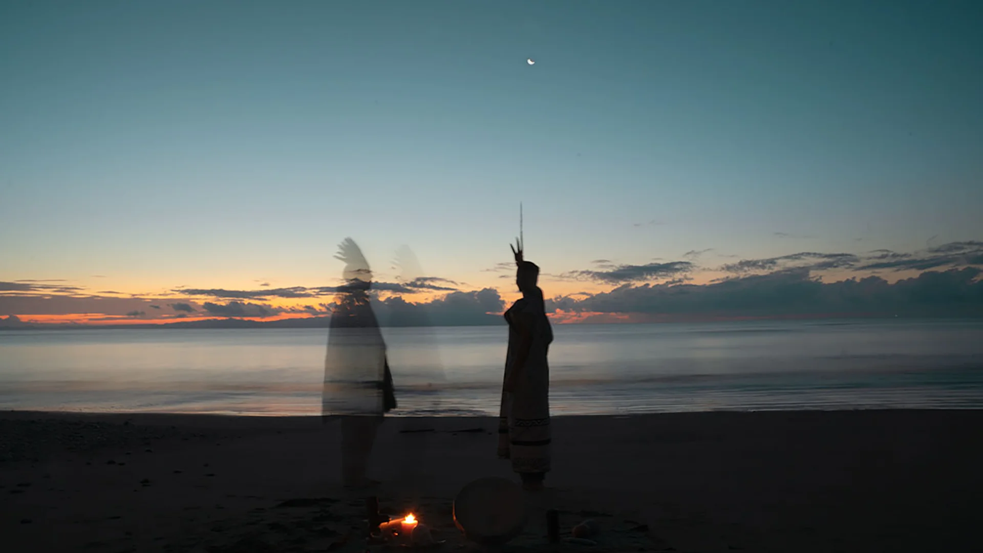 Plant medicine healers, standing at the beach at dawn during a Templo del Tigre retreat in Costa Rica.