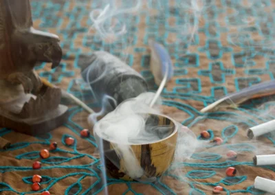 Medicine cup and altar with Mapacho smoke during one-on-one tobacco and trees — master plant dieta ceremony at Templo del Tigre plant medicine retreat in Costa Rica.